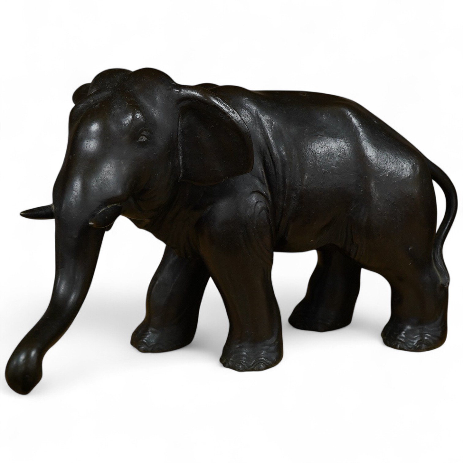 A late 19th century Japanese bronze of an elephant, 26cm